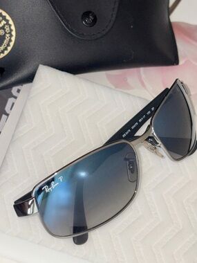 Ray-Ban Black Frame Sunglasses with Silver Temples
